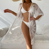 European and American Swimsuit Coat Sunscreen Bandage Sexy Hollow Cardigan Mid length Outer Embroidered Beach Bikini Cover up
