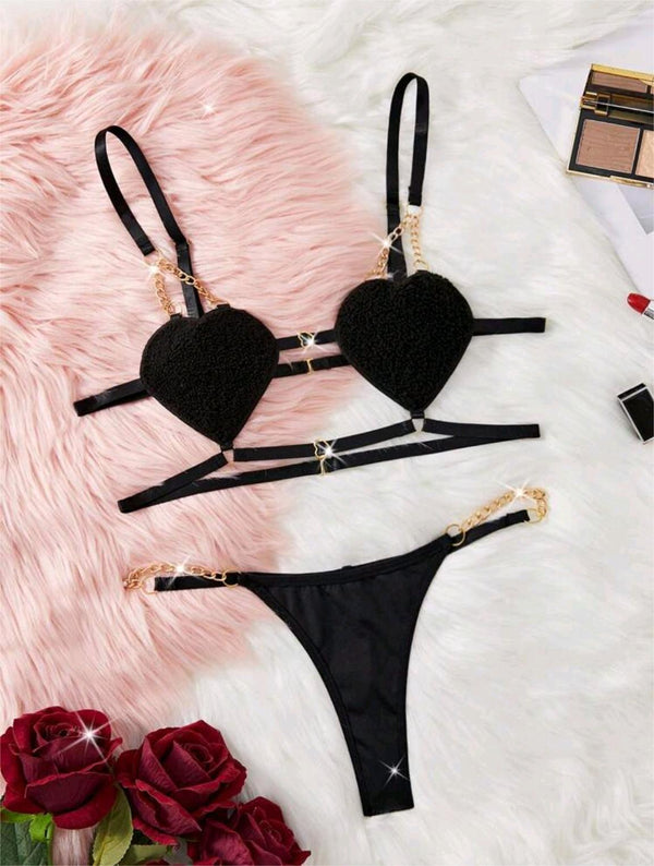 Luxury black heart chain lingerie set for womenRomantic french lace bralette close upGold strap premium lingerie detail
