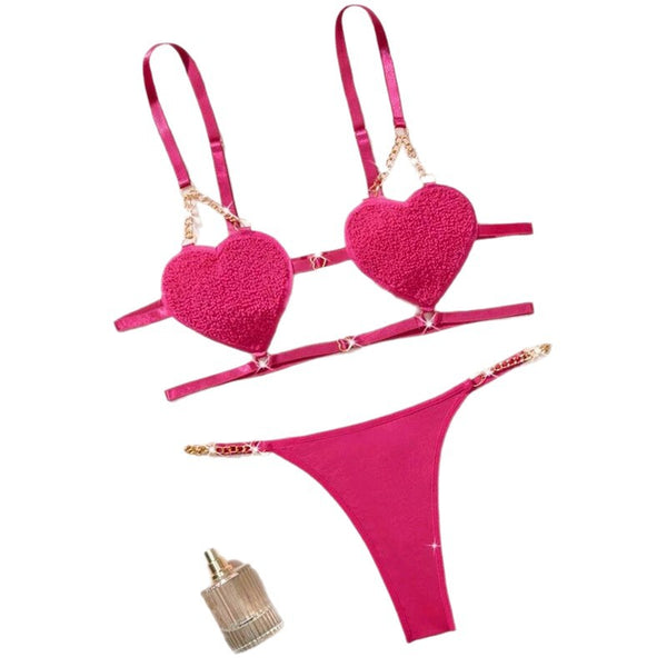 Luxury pink heart chain lingerie set for womenRomantic french lace bralette close upGold strap premium lingerie detail